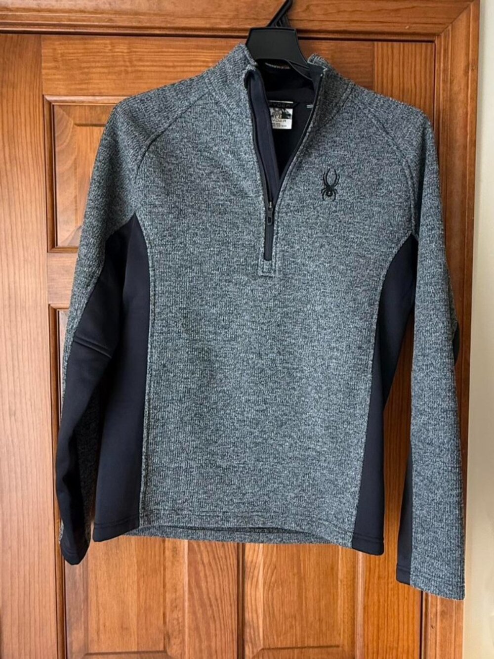 Grey and black Spyder quarter zip sweater